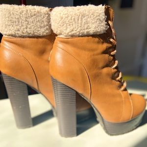 Brown faux leather ankle boot with faux fur
